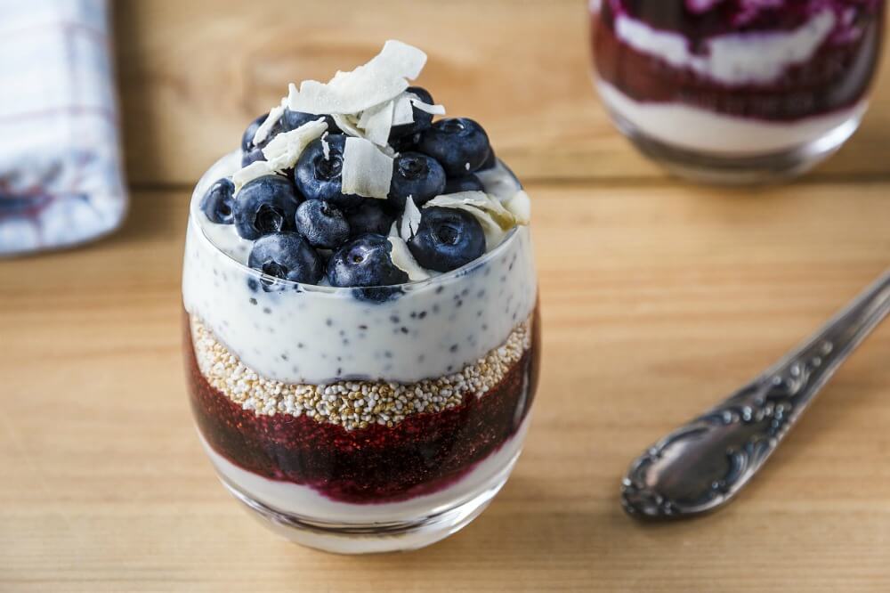 cup of vegan parfait with chia seeds and berries